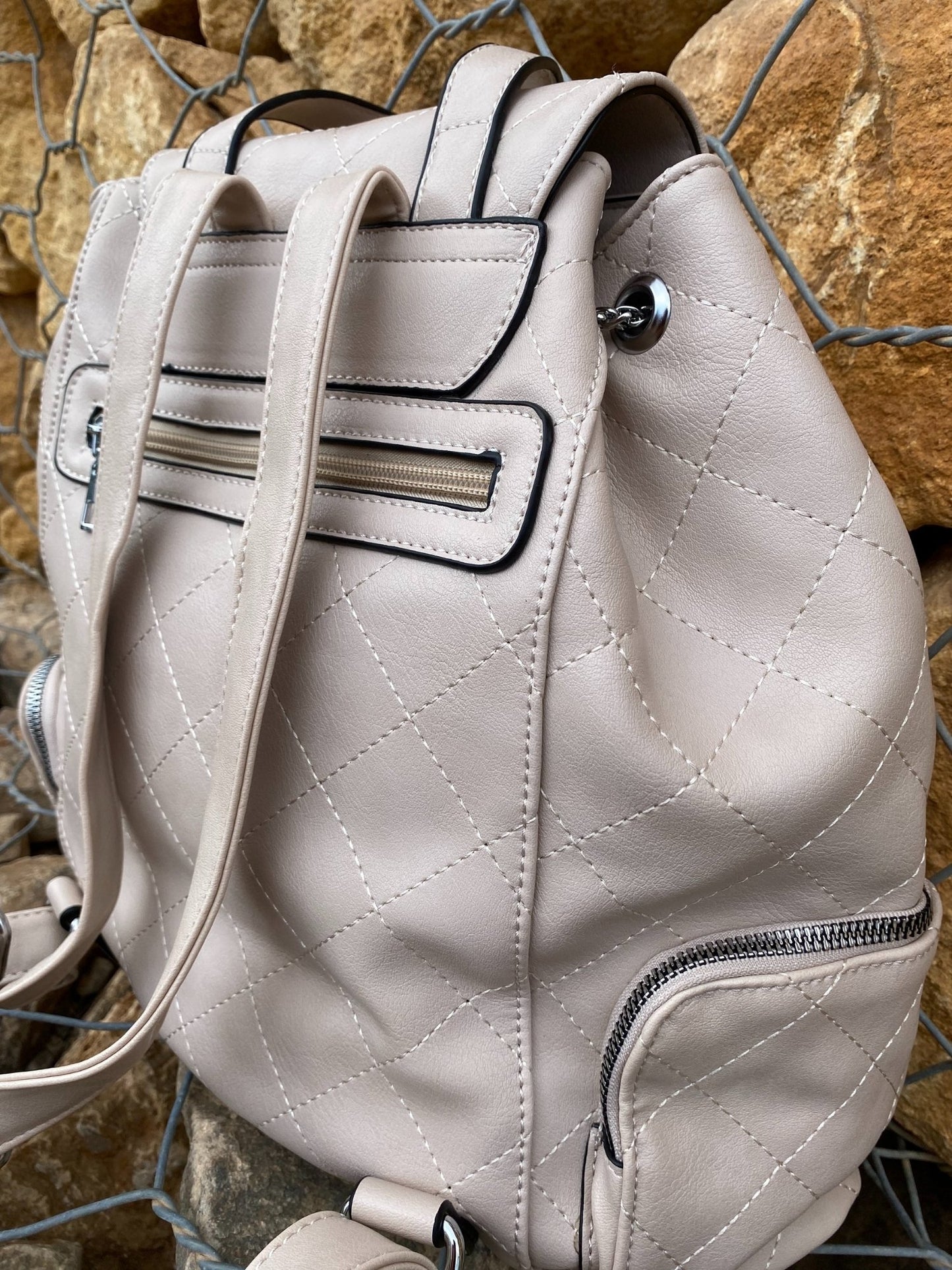 Cream Vegan Leather Backpack back side view of zipper and straps