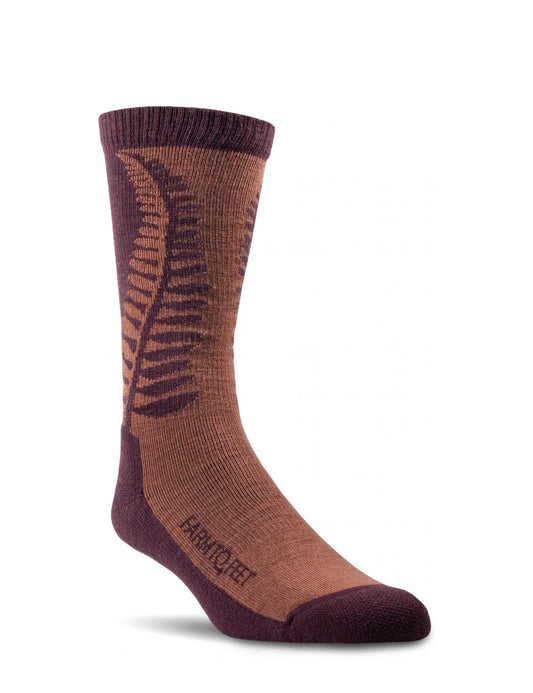 Brown and purple sock with leaf pattern on a white background