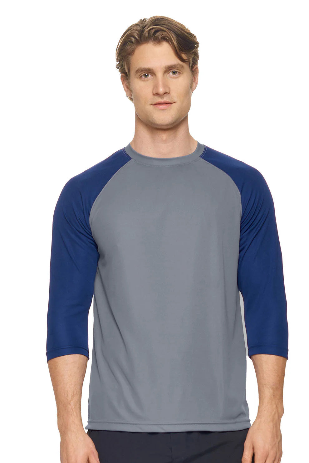 Man wearing a gray and blue baseball shirt on a white background
