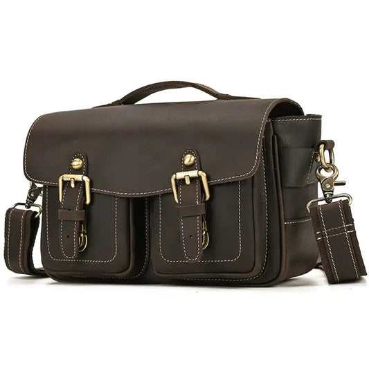 Brown vintage-style crossbody bag with flap closure and front buckle pockets