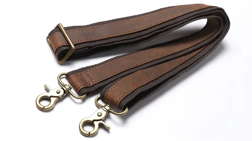 Brown leather shoulder strap with brass swivel rings and key clip attachments
