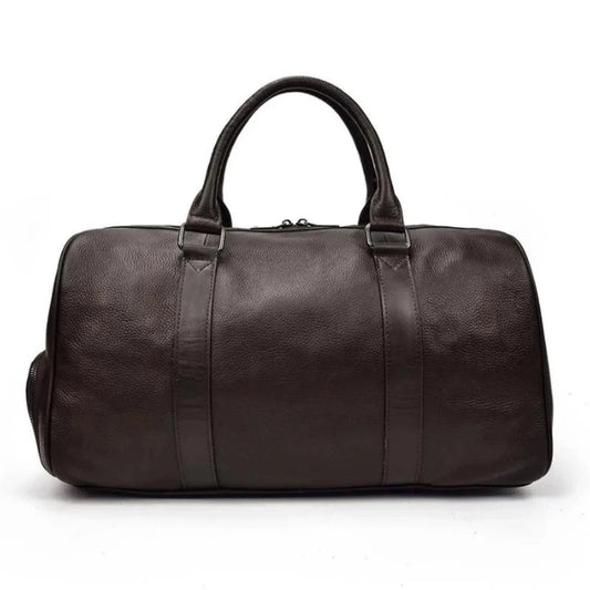 Brown leather weekender duffle bag with top handles and center panel seams.