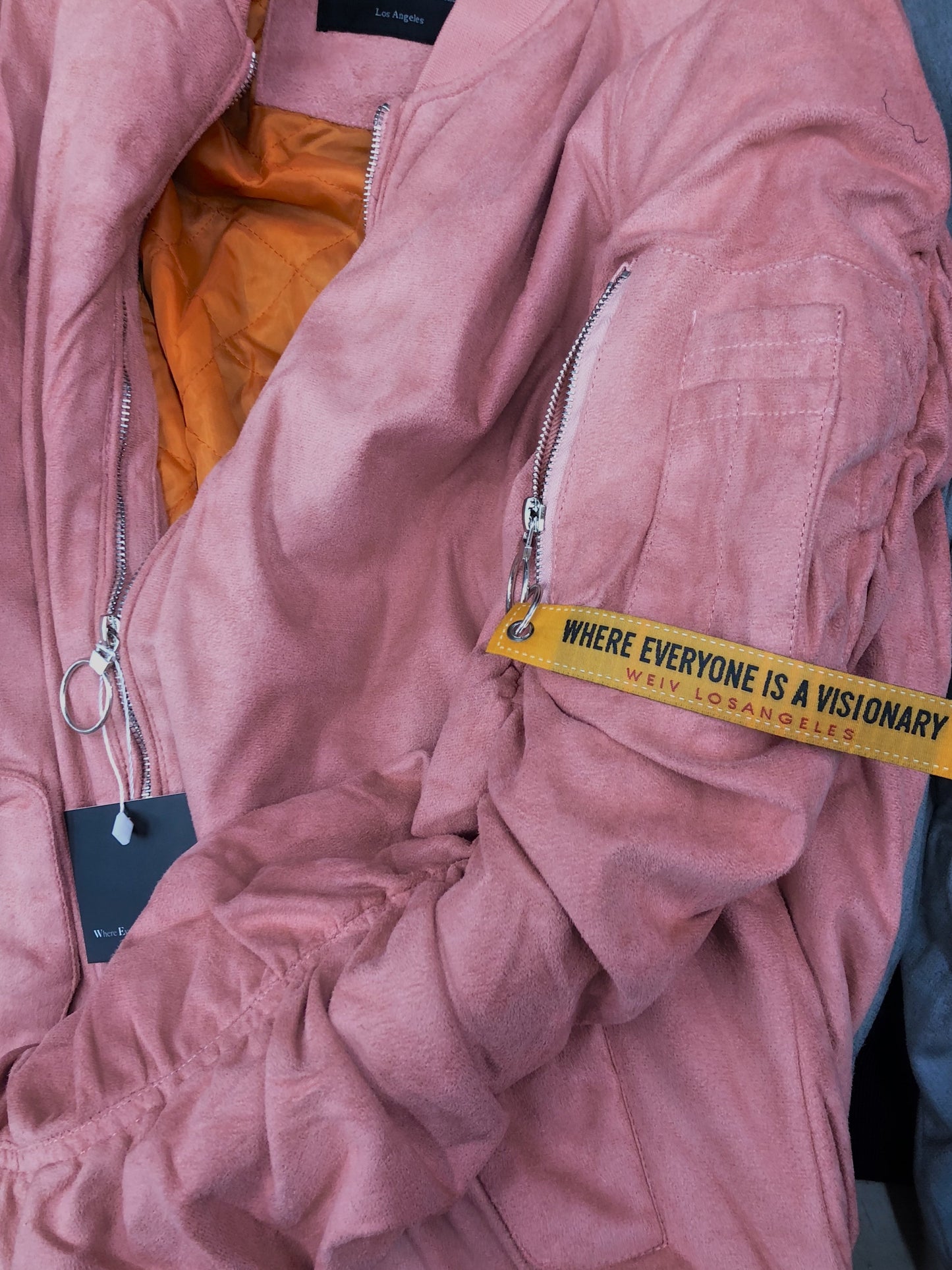 Picture of a Men's Pink Faux Suede Bomber Jacket close up