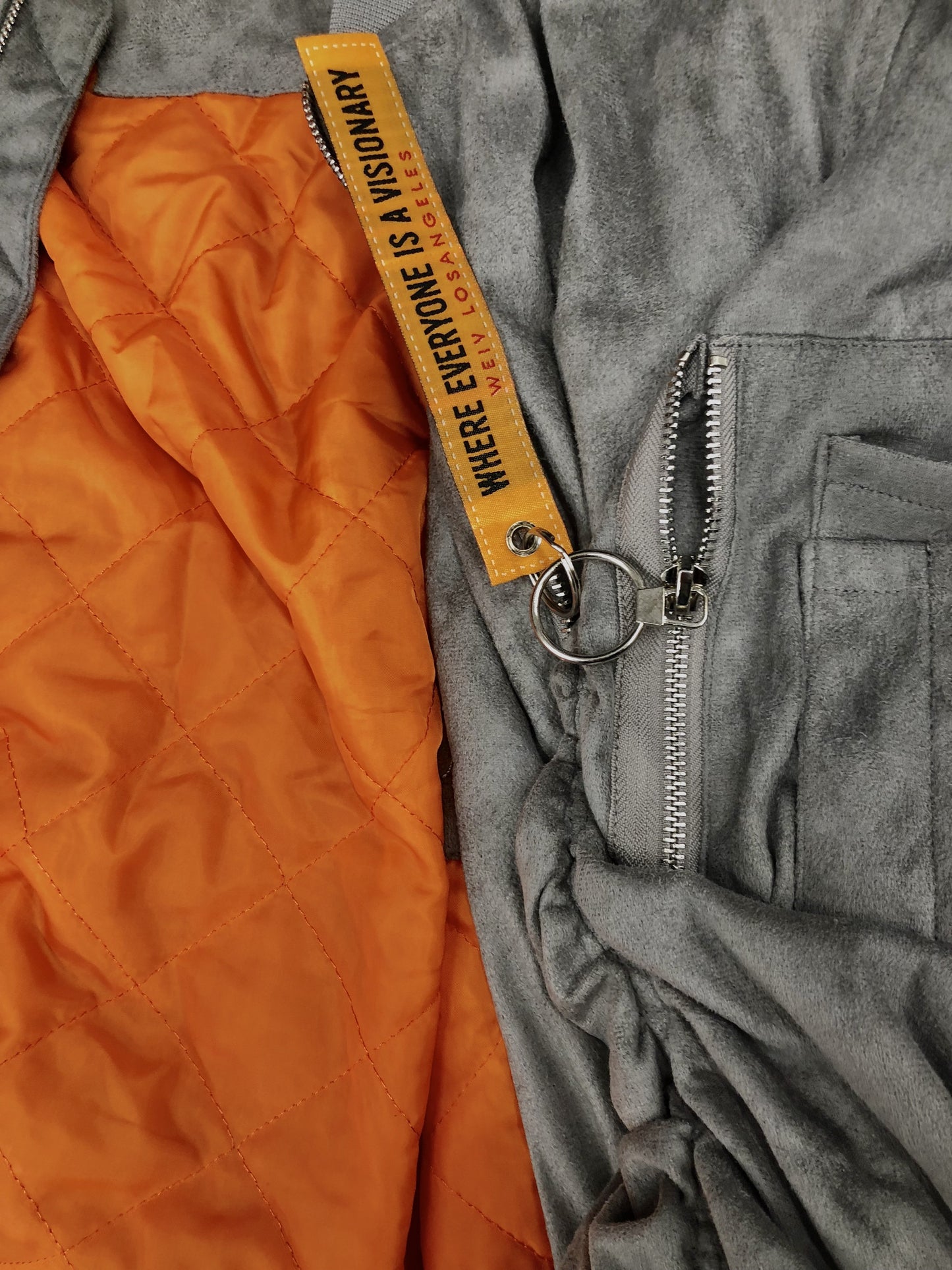 Picture of a Men's Silver Faux Suede Bomber Jacket close up