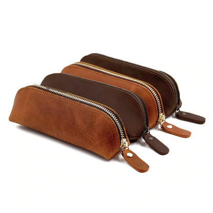 Set of two leather makeup pouches in brown and dark brown, zipper closures