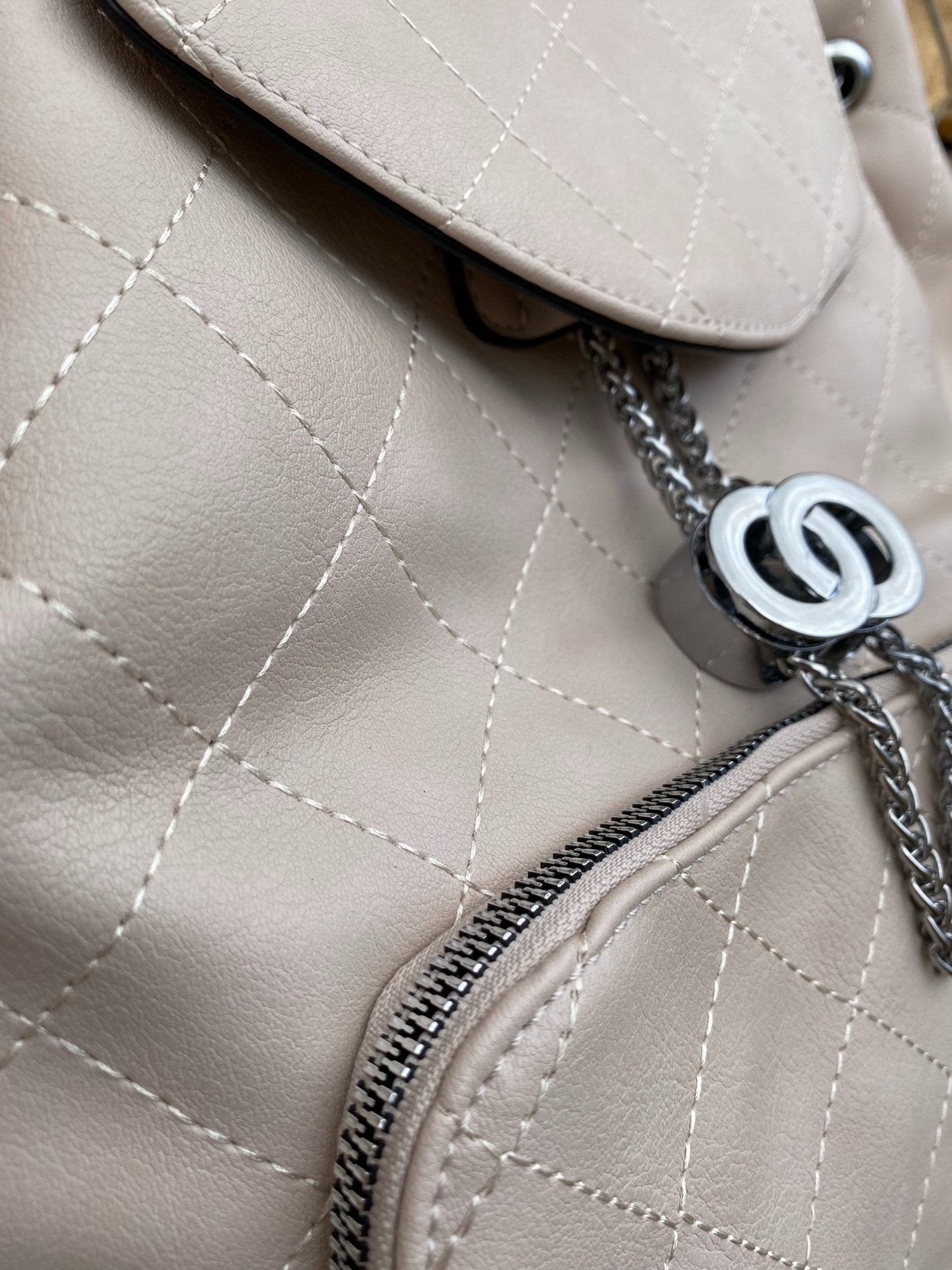 Cream Vegan Leather Backpack close up of stitching