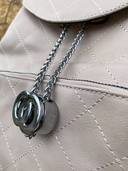 Cream Vegan Leather Backpack close up of chain