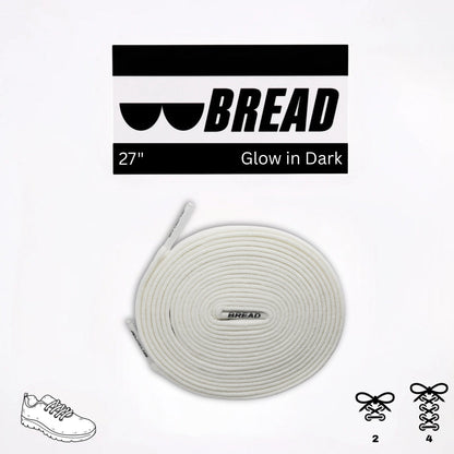 Glow in the dark shoelace with 'BREAD' branding on a white background