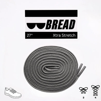Gray shoelaces with 'BREAD' branding on a white background