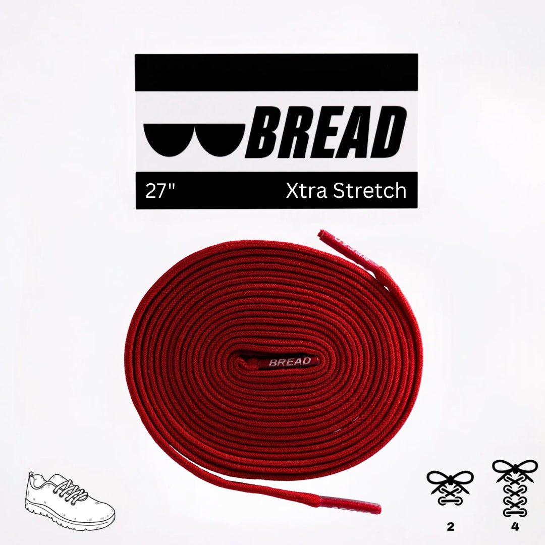 Red shoelaces with 'BREAD' branding on a white background