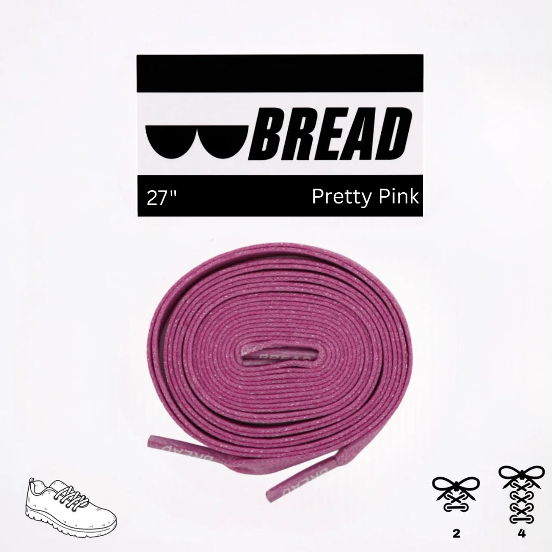 Pink shoelaces with 'BREAD' branding on a white background