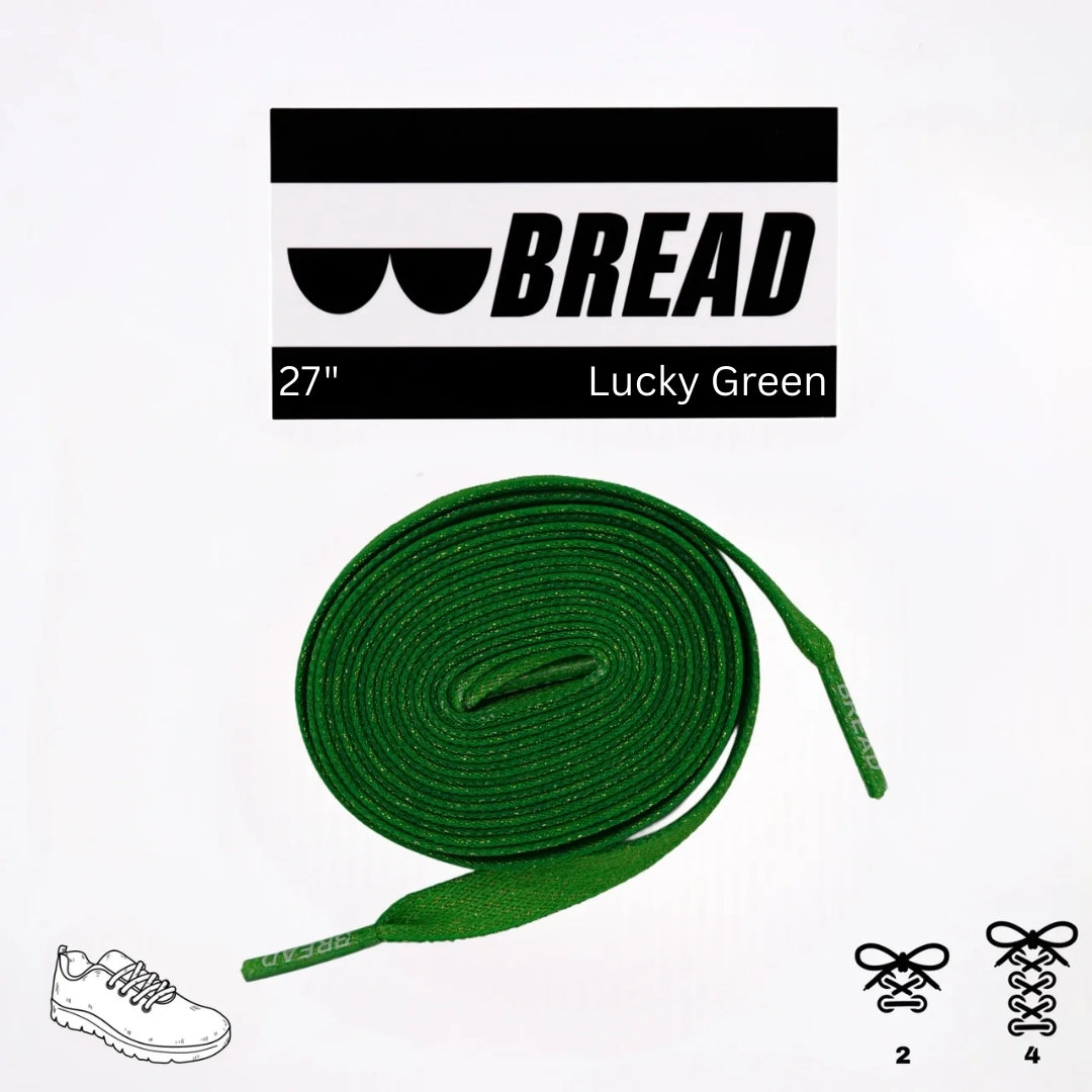 Green shoelaces with 'BREAD' branding on a white background