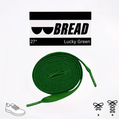 Green shoelaces with 'BREAD' branding on a white background