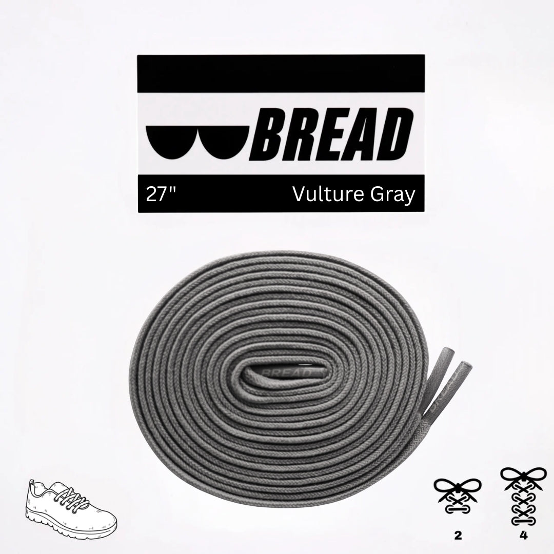 Gray shoelaces with 'BREAD' branding on a white background