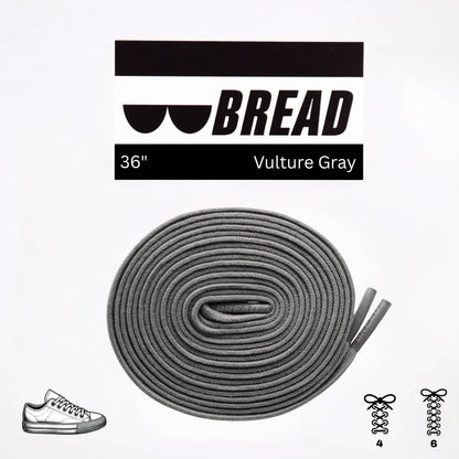 Gray shoelaces with 'BREAD' branding on a white background
