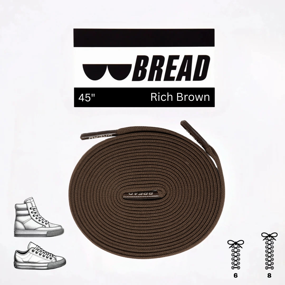 Brown shoelaces with 'BREAD' branding on a white background