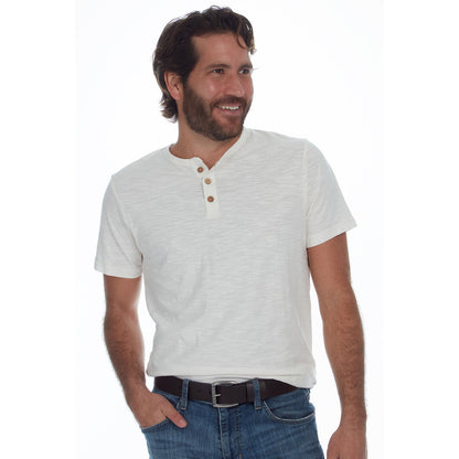 Man wearing a light gray henley shirt with brown buttons on a white background