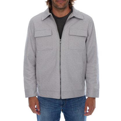 Man wearing a gray jacket with two front pockets on a white background