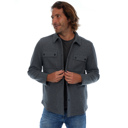 Man wearing a gray jacket on a white background