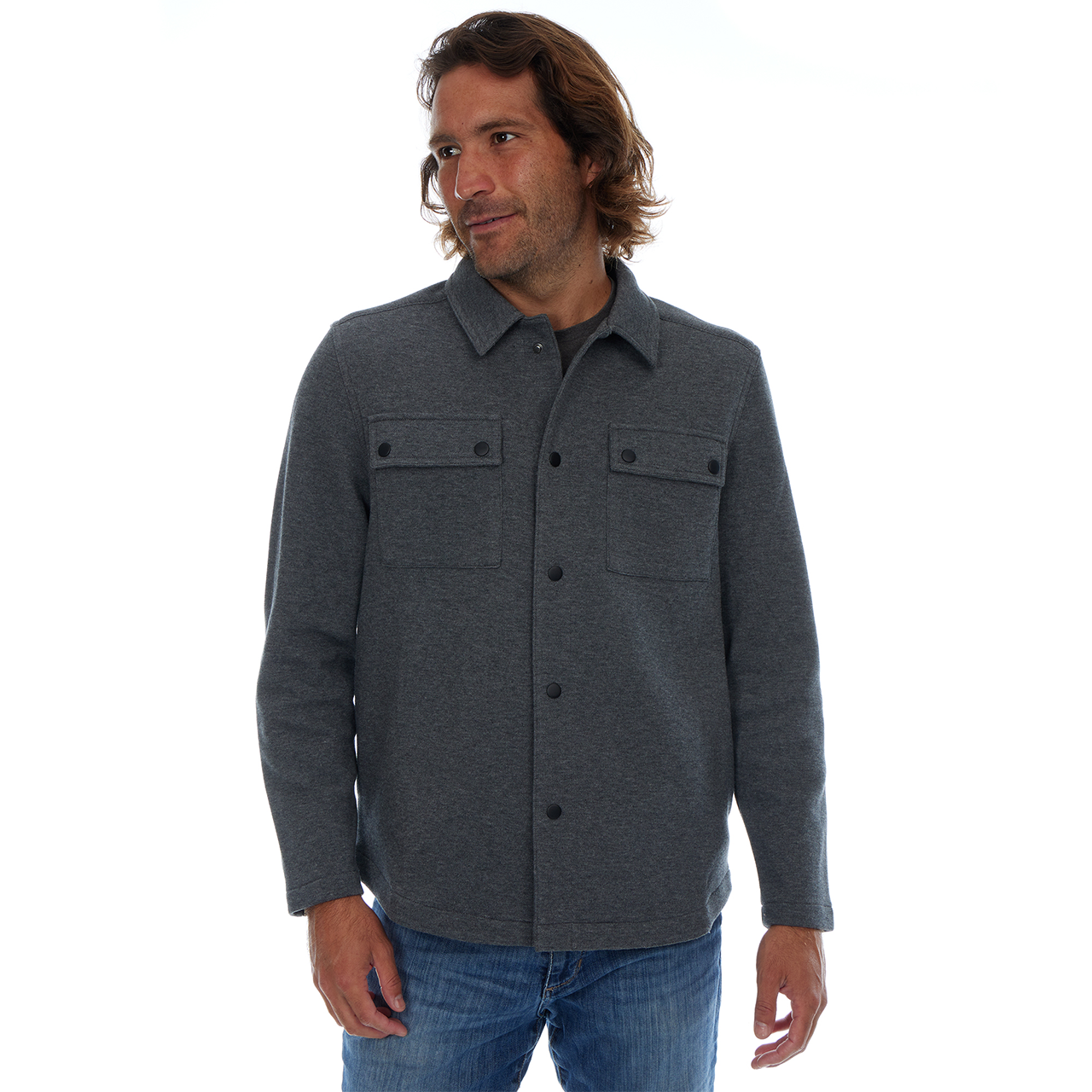 Man wearing a gray button-up shirt with a white background