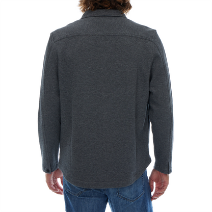 Person wearing a dark gray jacket on a white background