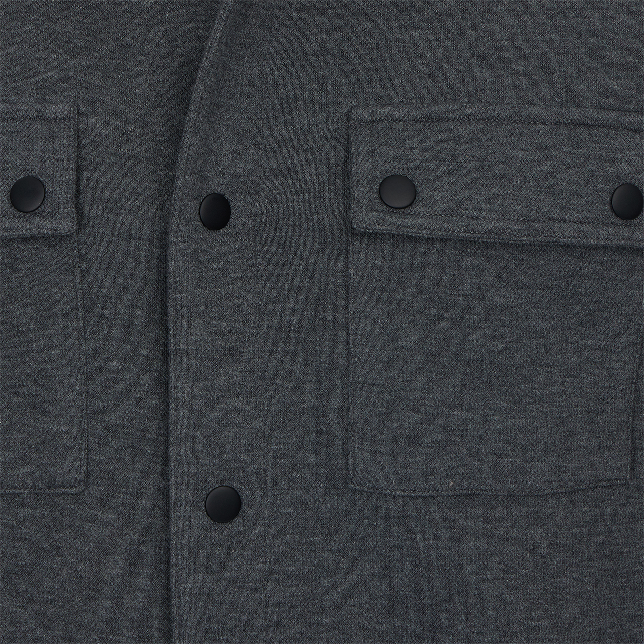 Close-up of a dark gray jacket with button details