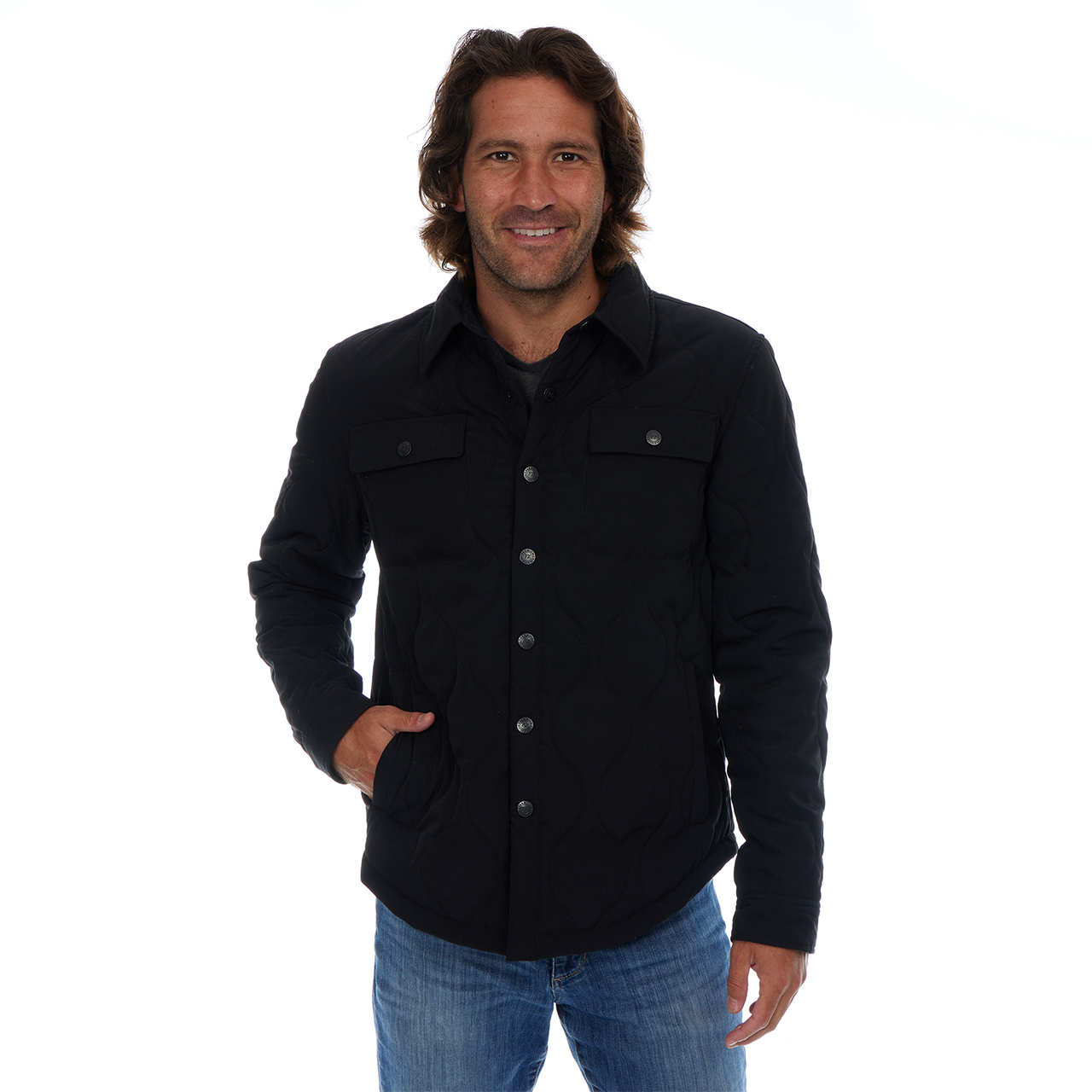 Man wearing a black jacket with button details on a white background