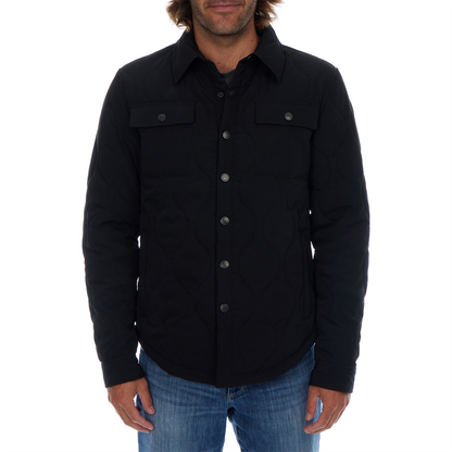 Man wearing a black button-up shirt with a white background