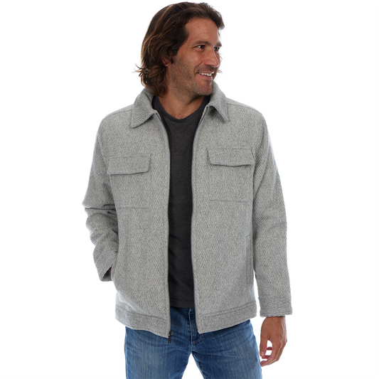 Man wearing a gray jacket on a white background