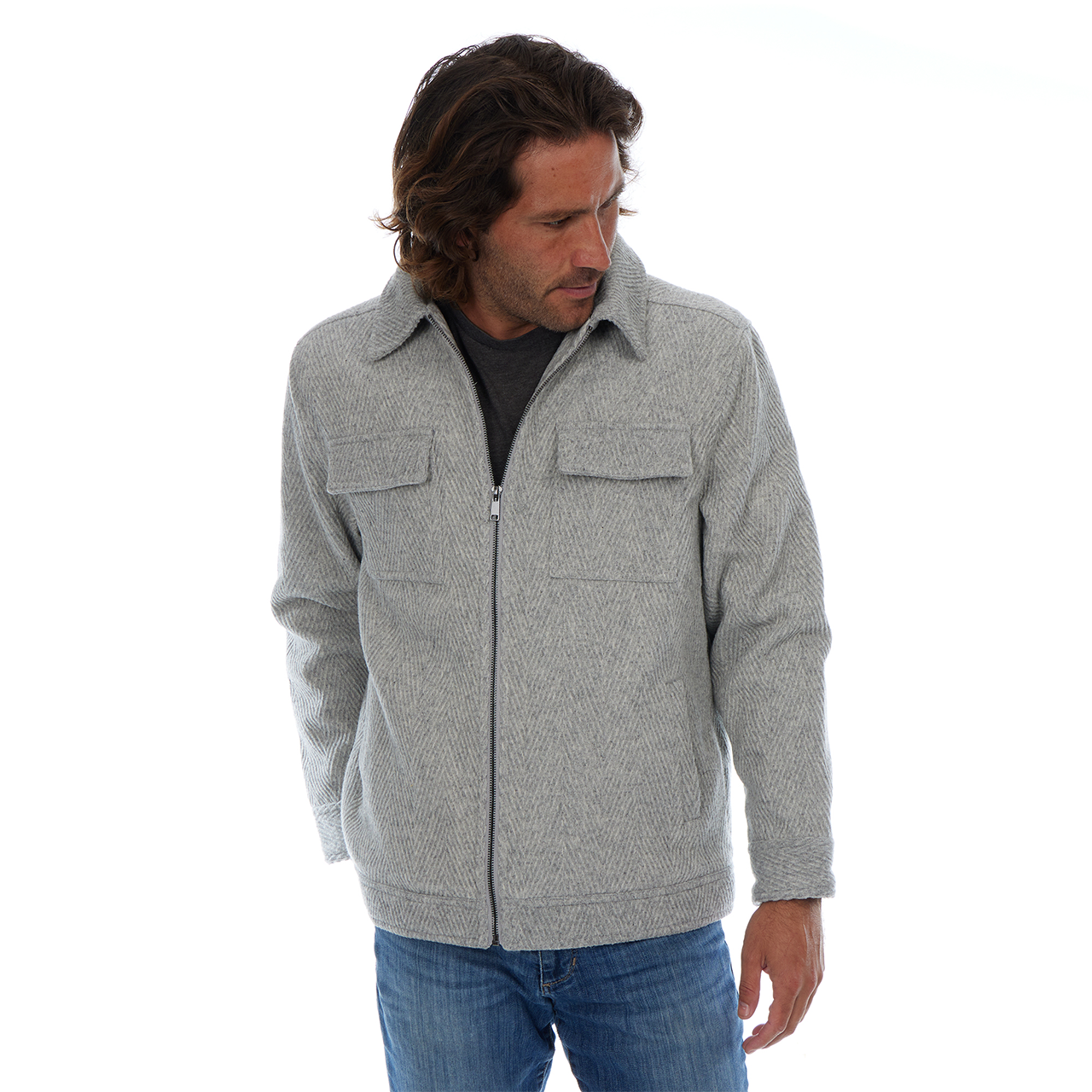 Man wearing a gray textured jacket on a white background