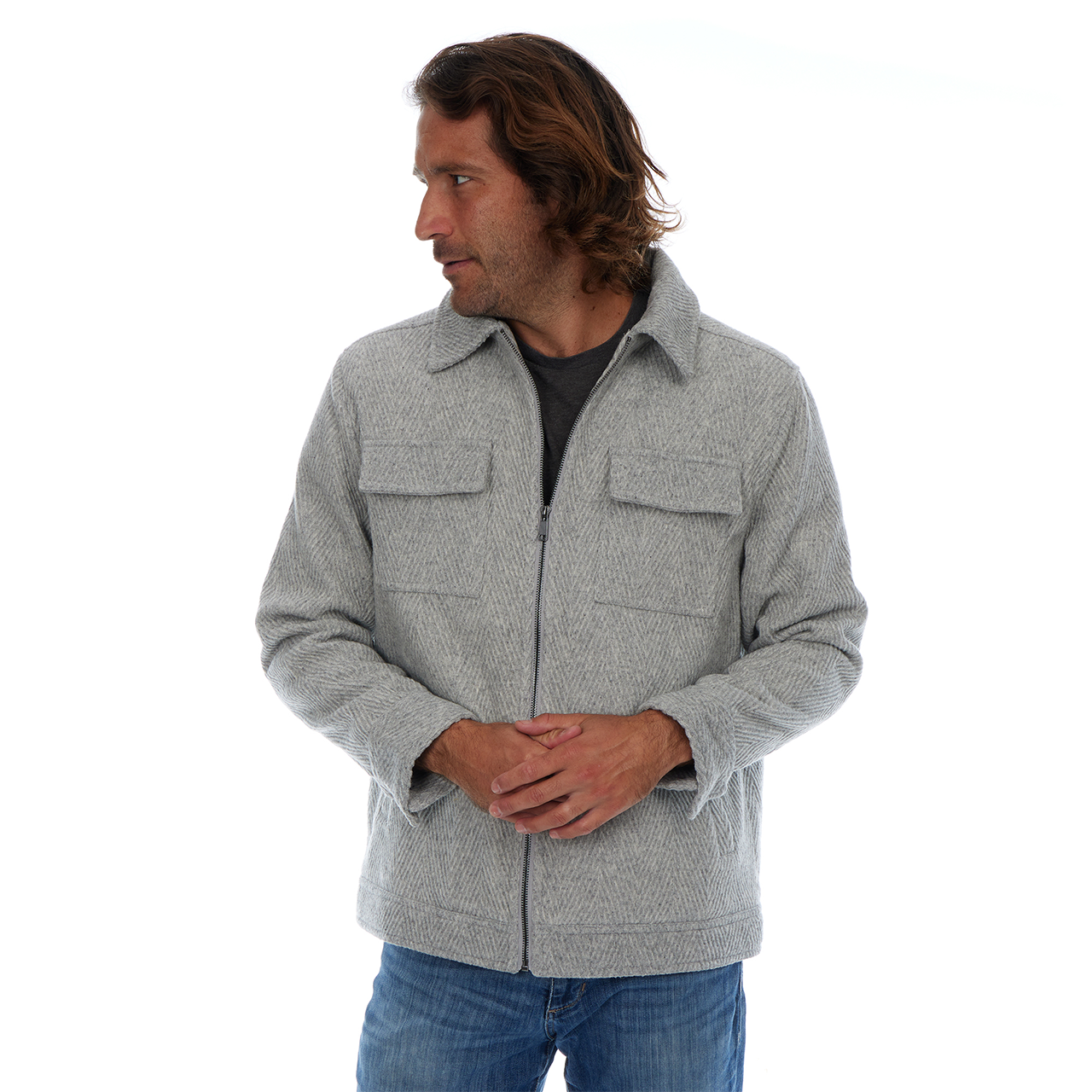 Man wearing a gray jacket on a white background