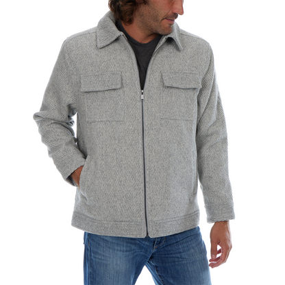 Man wearing a gray jacket with a white background