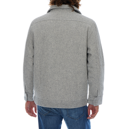 Gray jacket worn by a person on a white background