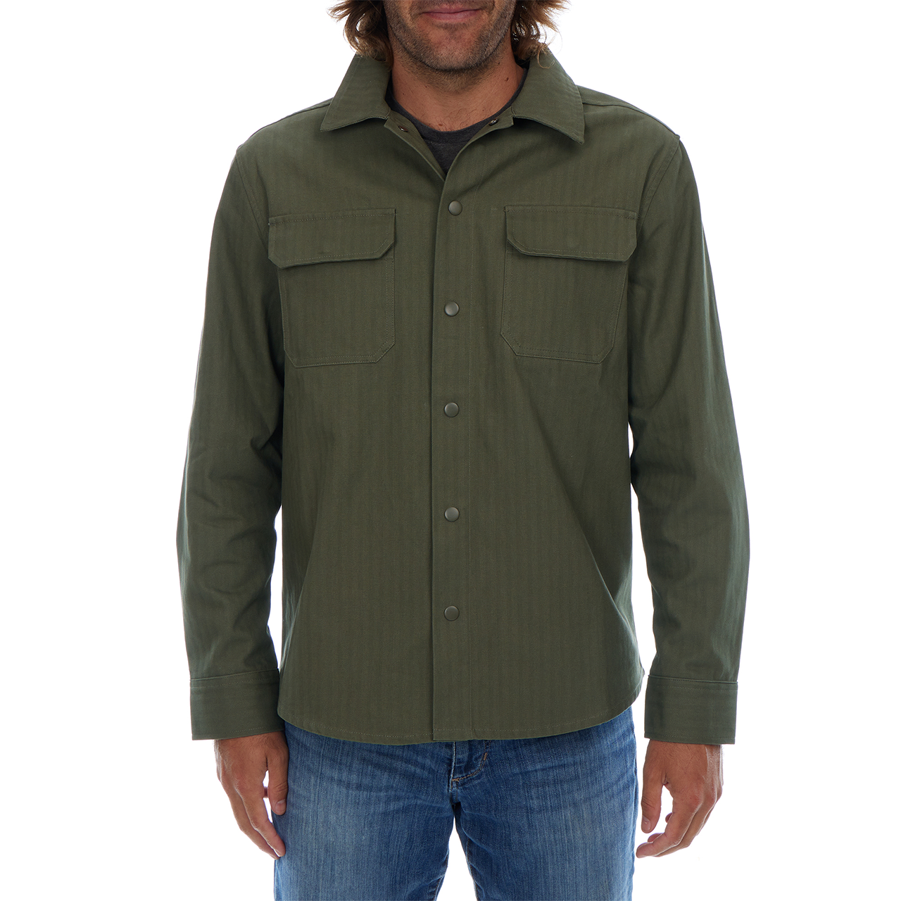 Green button-up shirt worn by a person on a white background