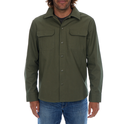 Green button-up shirt worn by a person on a white background