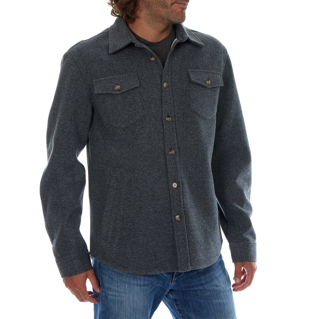 Man wearing a dark gray button-up shirt with a white background