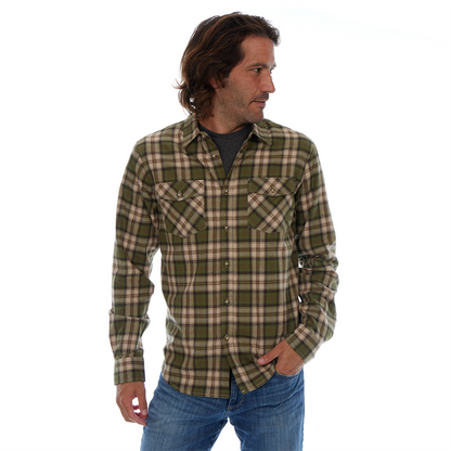 Man wearing a green and beige plaid shirt on a white background