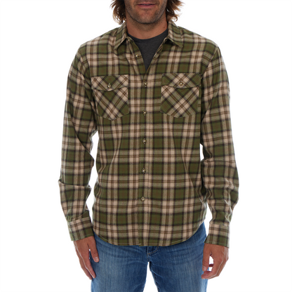 Man wearing a green and beige plaid shirt on a white background