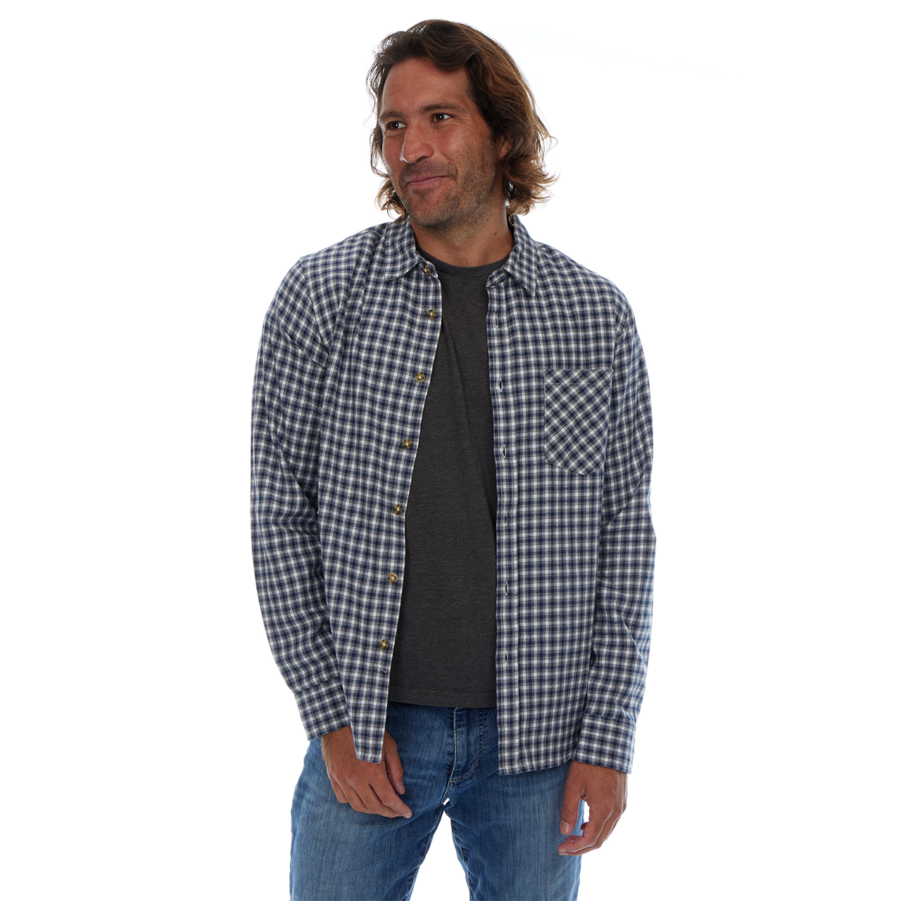 Man wearing a checkered shirt over a black t-shirt on a white background