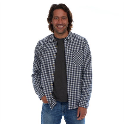 Man wearing a checkered shirt over a black t-shirt on a white background