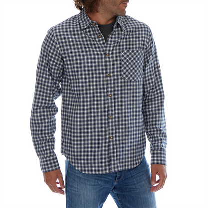 Man wearing a blue and white checkered shirt with long sleeves on a white background