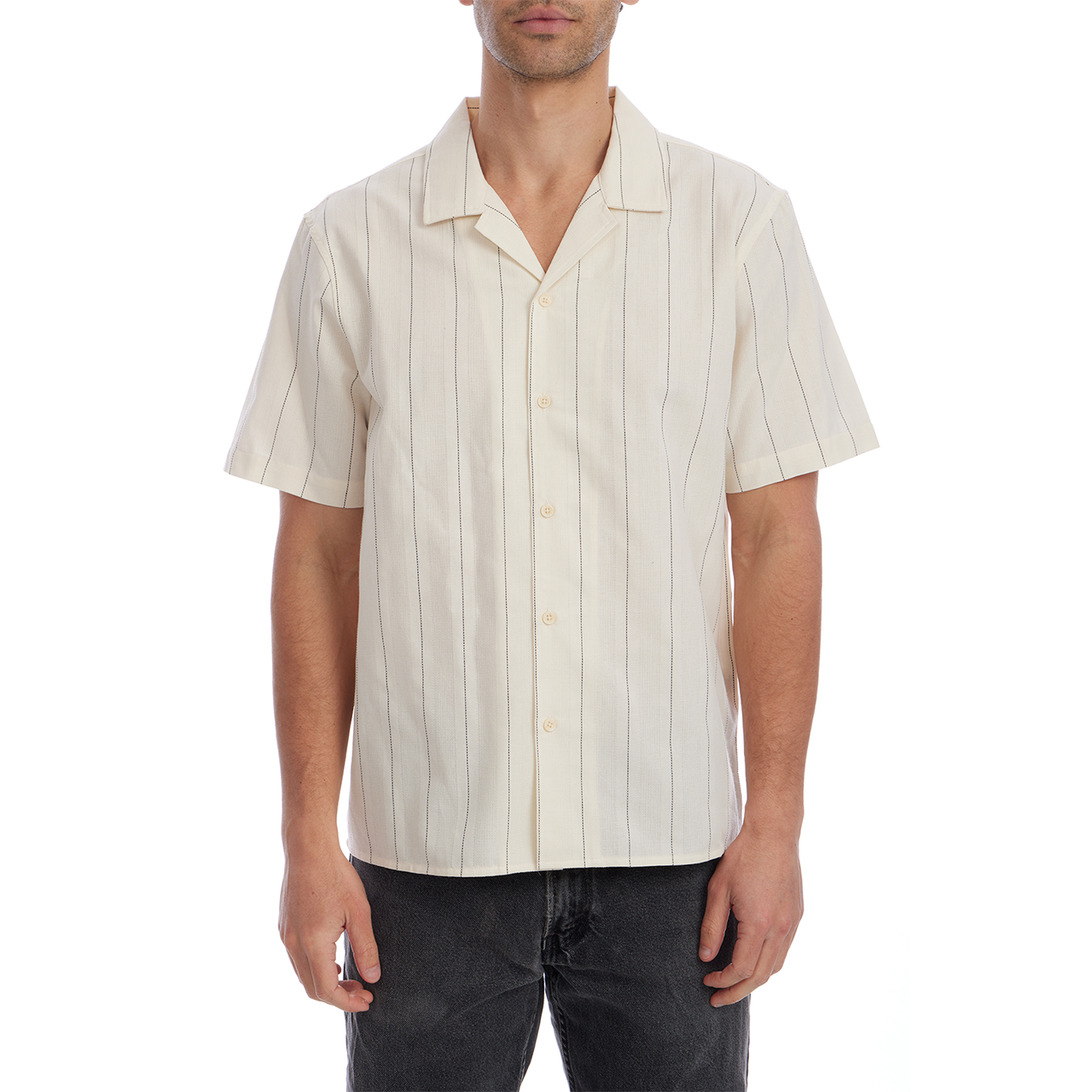 Man wearing a cream-colored short-sleeve shirt with thin stripes on a white background