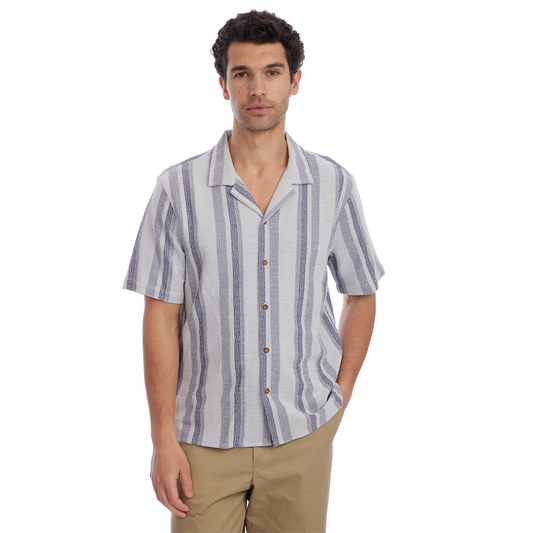 Man wearing a striped shirt on a white background