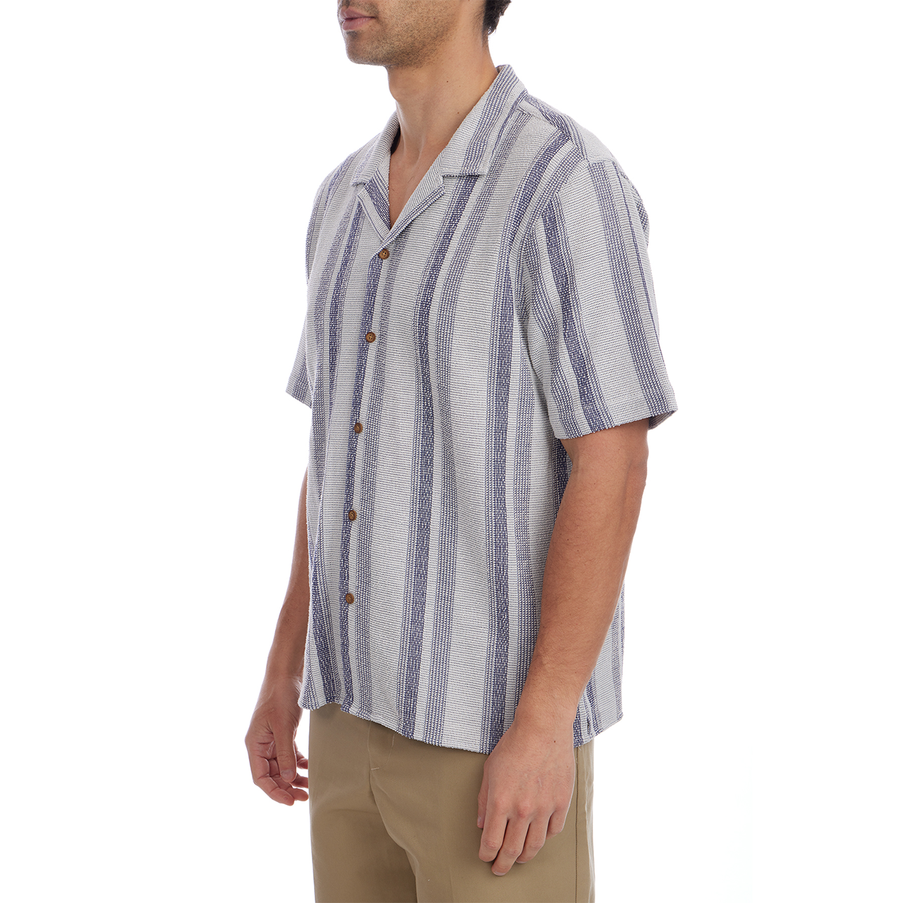 Man wearing a striped short-sleeve shirt on a white background