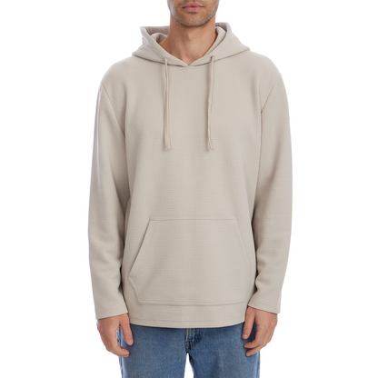 Beige hoodie worn by a person on a white background