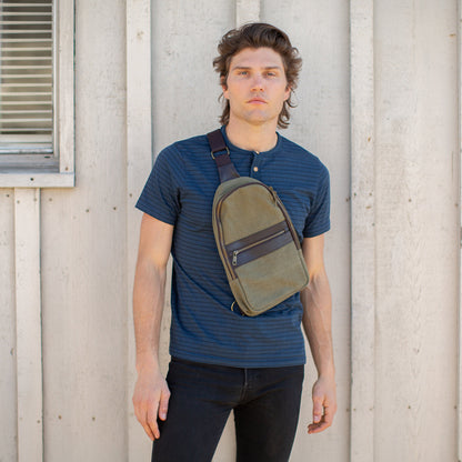 Short Sleeve Blue Striped Henley model wearing a backpack over the front