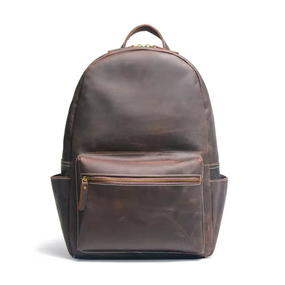 Brown leather backpack on a white background