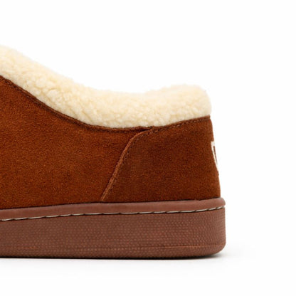 Brown slipper with white lining on a white background