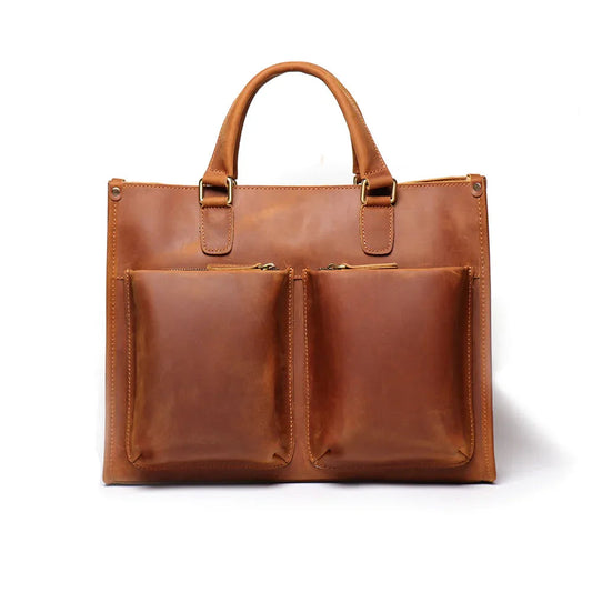 Brown leather messenger bag with two front pocket compartments and top handles