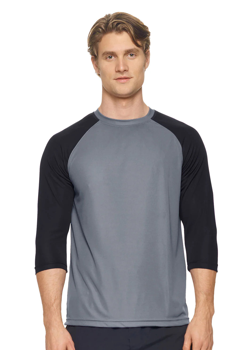 Man wearing a gray and black baseball shirt on a white background